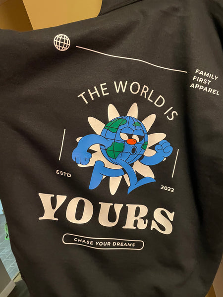 black hoodie with the world is yours. 